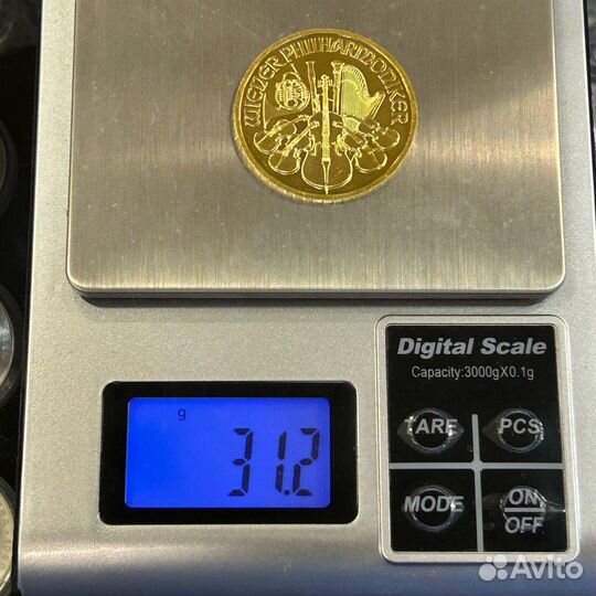 Золотая монета 31.1гр филармоникер