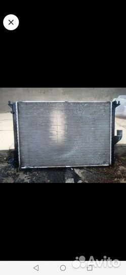 Радиатор охлаждения на renault logan 1 ресталинг