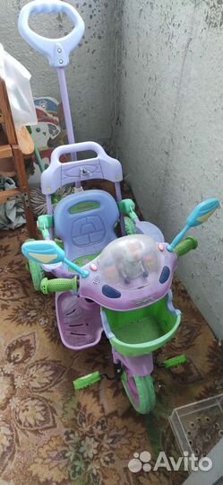 Велосипед с родительской ручкой с музыкой