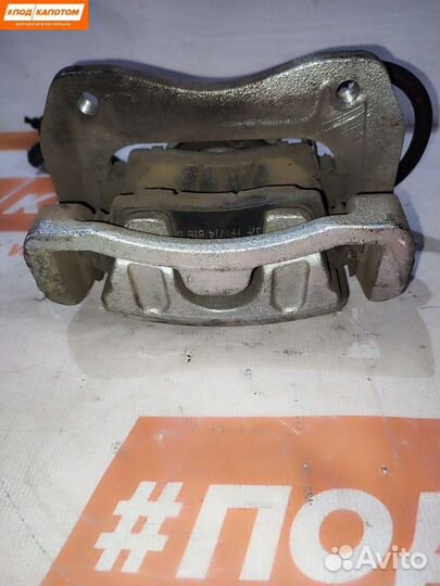 Суппорт тормозной передний правый Kia Sportage 4