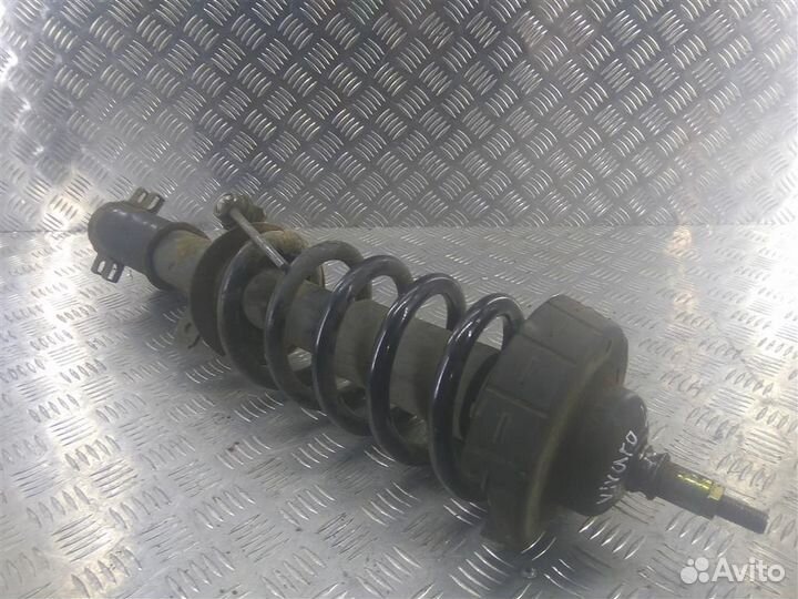 Стойка амортизатора передняя левая Опель Vivaro A