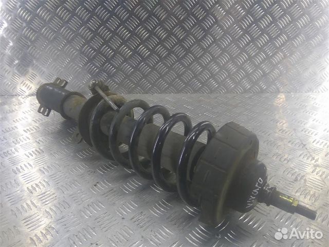 Стойка амортизатора передняя левая Опель Vivaro A