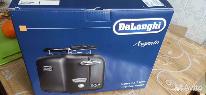 Тостер delonghi