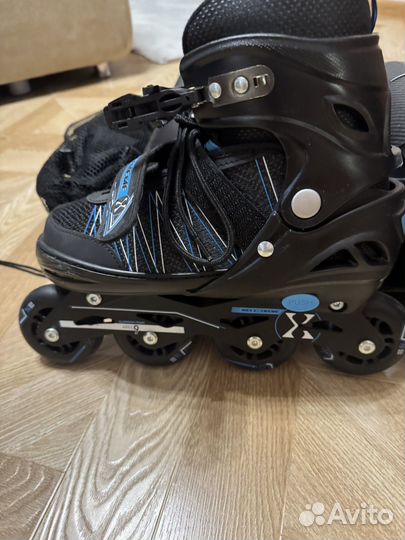 Роликовые коньки