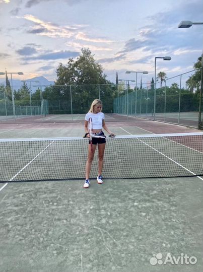 Тренер по теннису