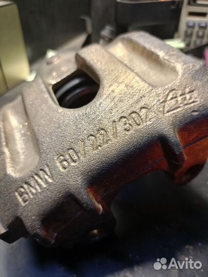 Суппорт тормозной передний bmw