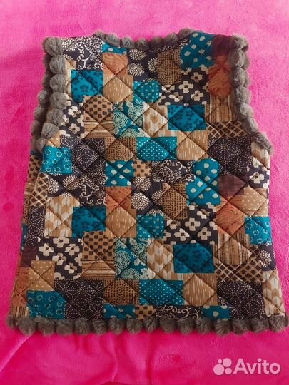 Тёплая безрукавка женская