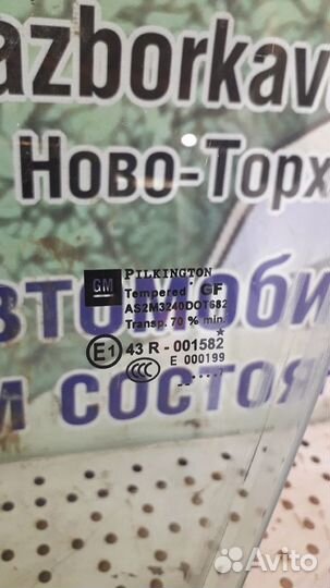 Стекло двери переднее левое Opel Astra J