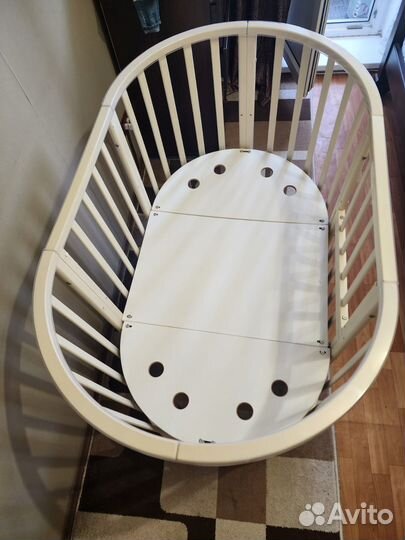 Детская кроватка с поперечным маятником