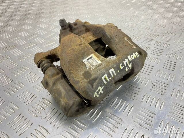 Суппорт тормозной передний правый Citroen C4 B7