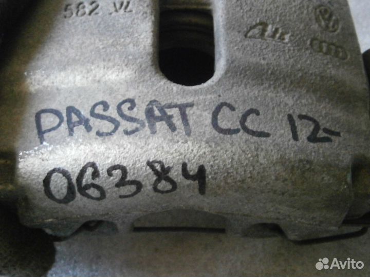 Суппорт передний правый Volkswagen Passat CC