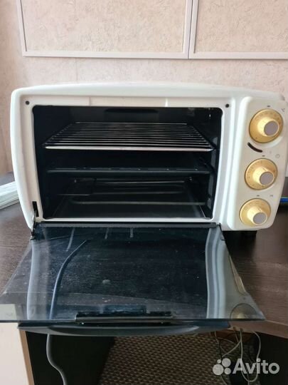 Электропечь (мини духовка) DeLonghi