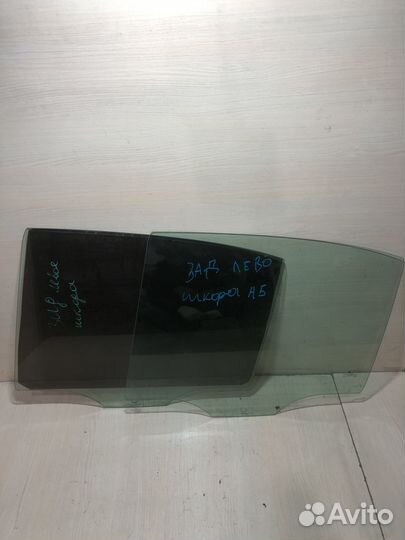 Стекло двери задней левой Skoda Octavia A5