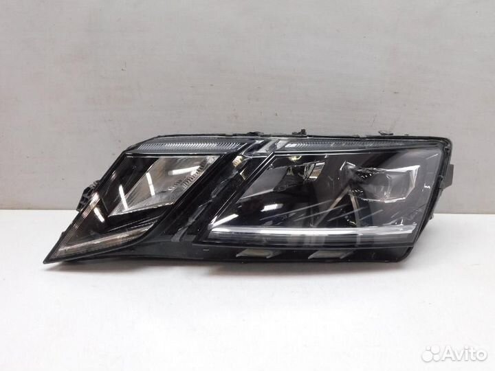Фара левая Skoda Octavia