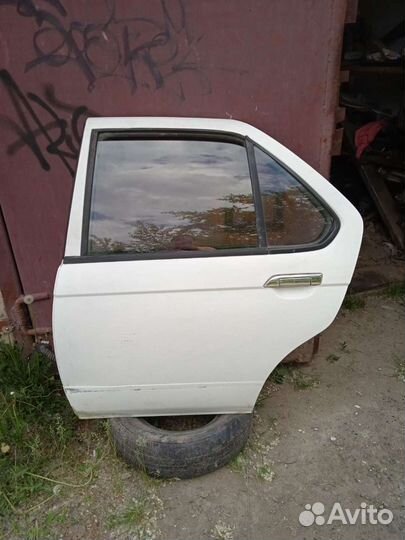 Дверь задняя левая Ниссан Блюберд EU14