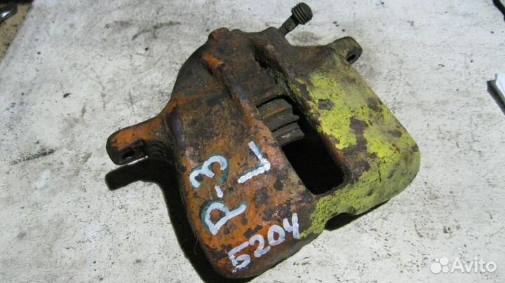 Суппорт передний левый Volkswagen Passat