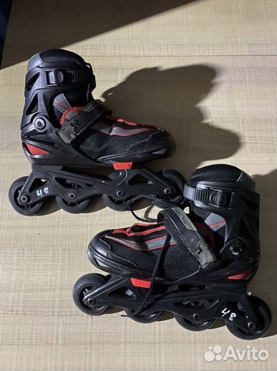 Роликовые коньки