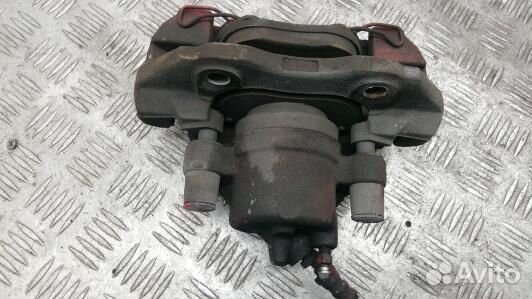 Суппорт тормозной передний левый mazda 3 1 (HBR14K