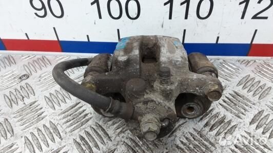 Суппорт тормозной задний левый KIA sportage 3 (ZML