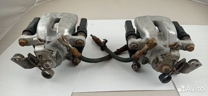 Суппорт тормозной задний Opel Astra G 1999