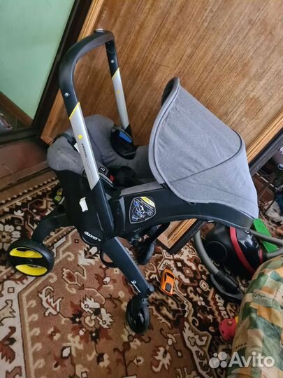 Коляска автокресло doona с базой isofix
