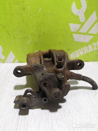 Суппорт задний левый Фольксваген Гольф 3 Венто