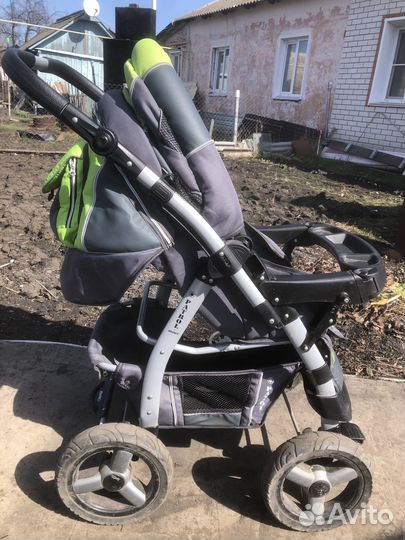 Коляска адамакс