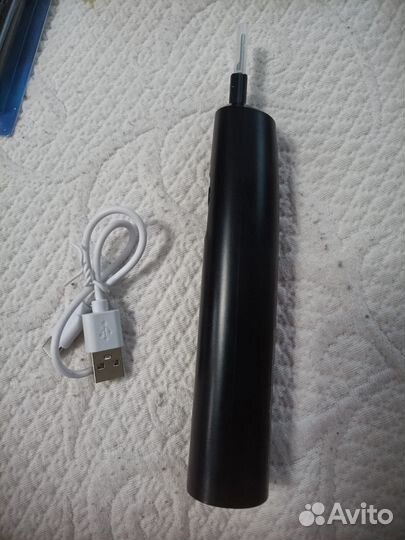 Электронная зубная щетка