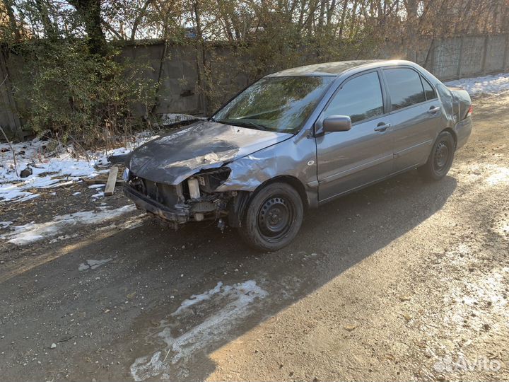 Mitsubishi Lancer 1.6 МТ, 2009, битый, 195 000 км