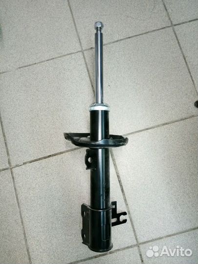 Амортизатор передний Опель Астра Н