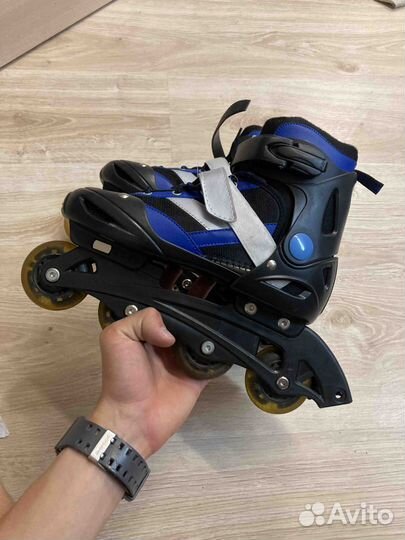 Роликовые коньки