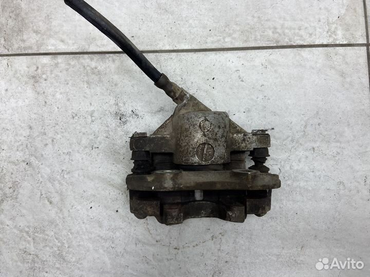 Тормозной суппорт передний левый ваз (LADA) Ока