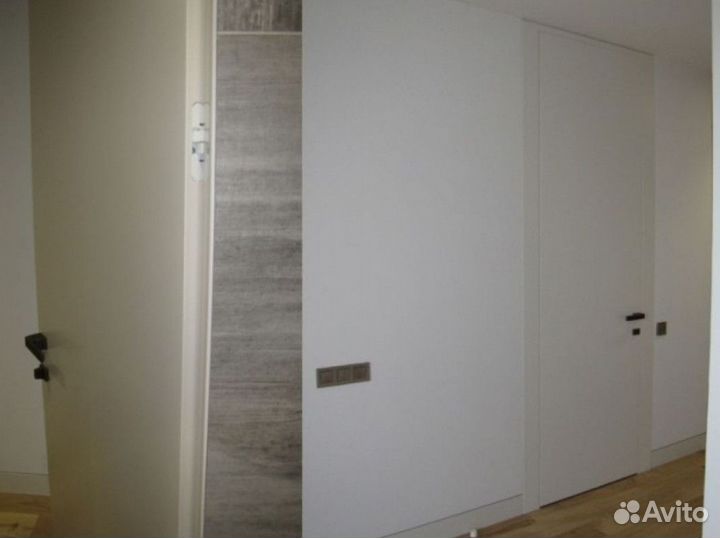 Межкомнатная скрытая дверь под отделку