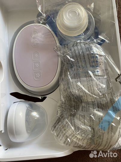 Молокоотсос электрический новый