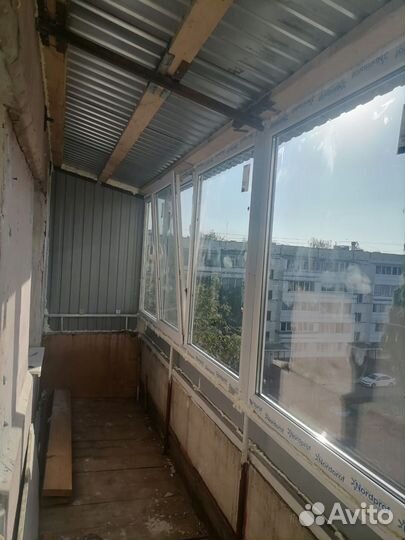 Окна на балкон от компаний Окна-тат