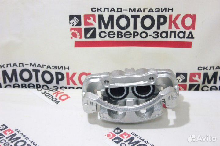 Суппорт тормозной передний левый Nissan Terrano