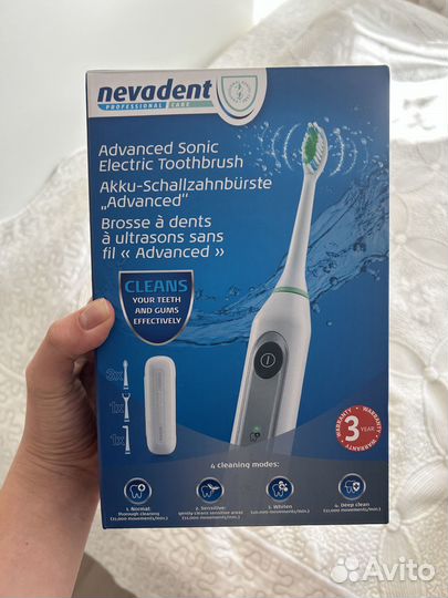 Электрическая звуковая зубная щетка