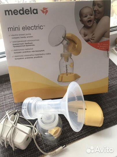 Молокоотсос medela электрический