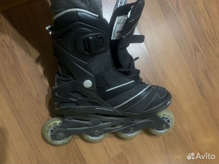 Роликовые коньки