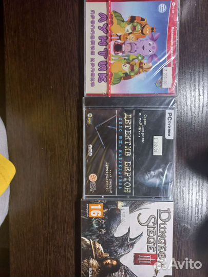 Запечатанные компьютерные диски с играми