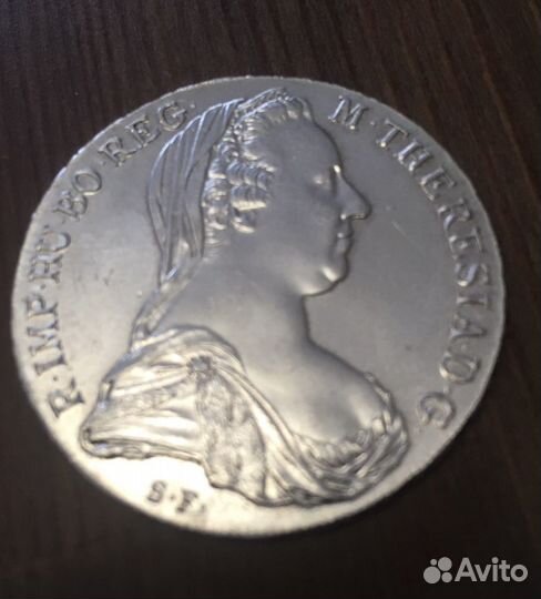 Монета серебряная