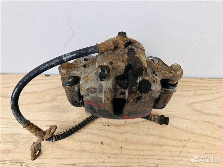 Суппорт тормозной передний левый Kia Cerato 2 1.6