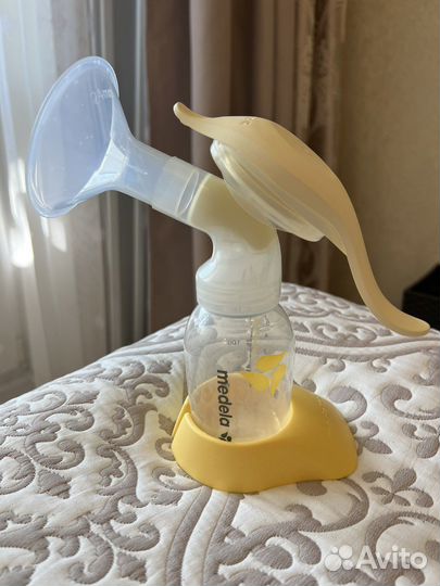Молокоотсос medela ручной