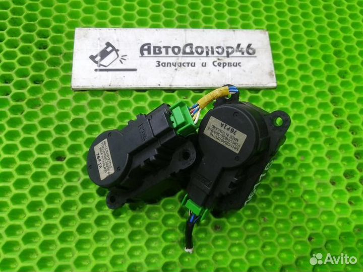 Моторчик заслонки отопителя Mitsubishi Lancer X