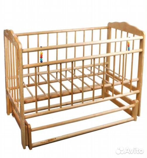 Детская кроватка с маятником