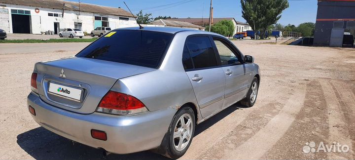 Mitsubishi Lancer 1.6 МТ, 2005, 195 000 км
