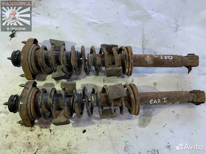 Задние Стойки амортизатора Mitsubishi carisma