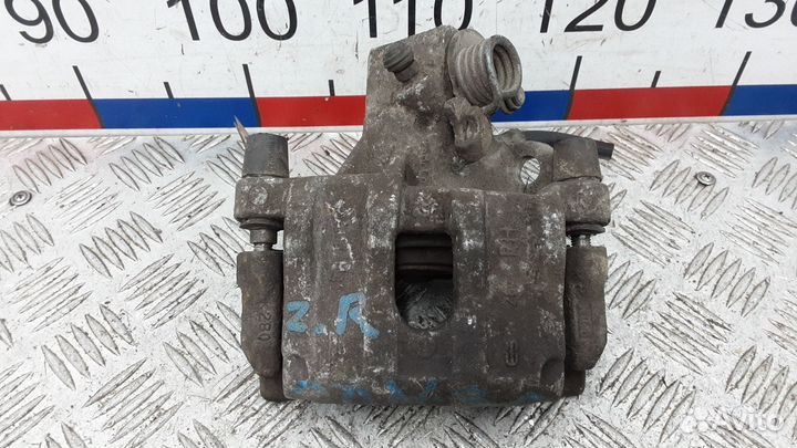 Суппорт тормозной задний правый на Ford Focus 2