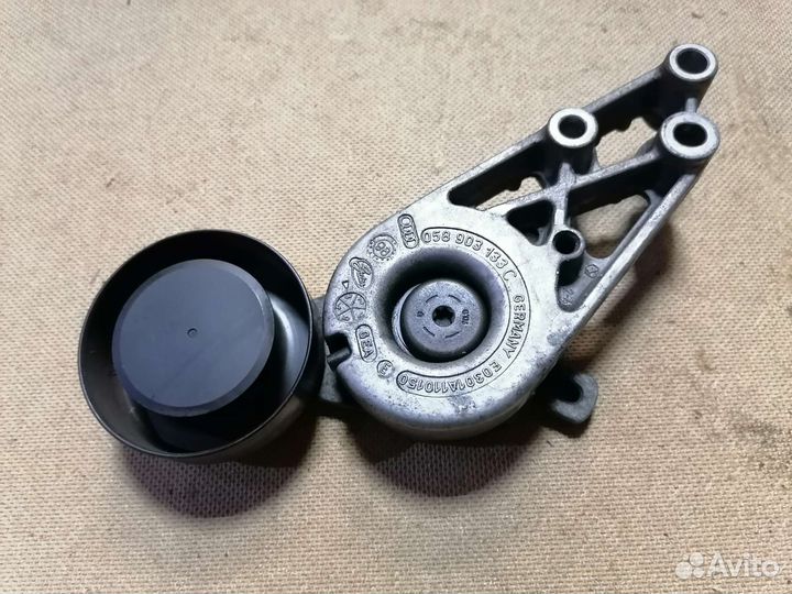 Натяжитель ремня генератора Audi, VW, 058903133C