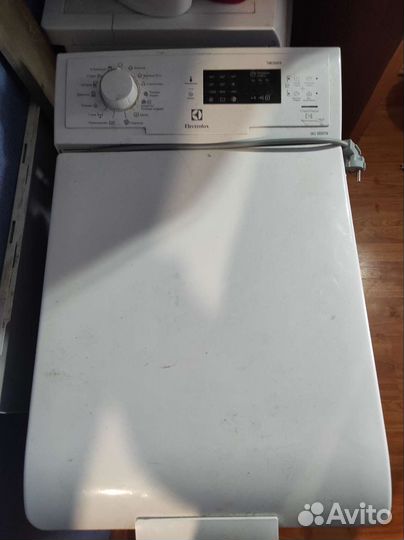 Стиралка с вертикальной загрузкой Electrolux